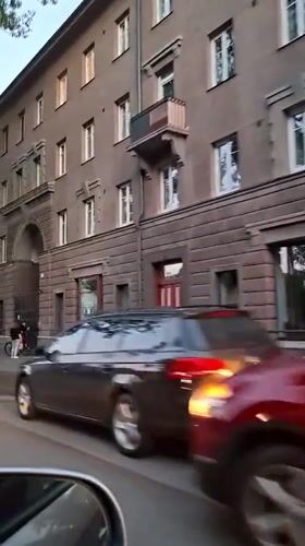 Evening drive-by footage captures routine Tallinn street scenes