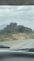 Vehicle journey through rocky terrain near Vom, Nigeria documented