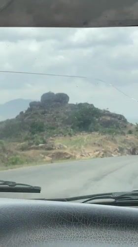 Vehicle journey through rocky terrain near Vom, Nigeria documented
