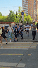 Morning pedestrian activity observed near railway crossing in Khimki