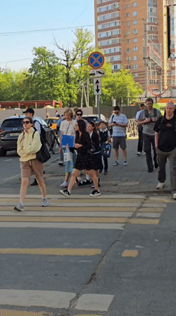 Morning pedestrian activity observed near railway crossing in Khimki