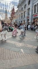Themed mall vibes: fashion, carousels, and arched glass ceilings