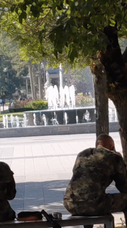 Military band at rest in a Pleven park with instruments