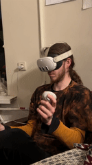 Man uses VR headset in Moscow chair session