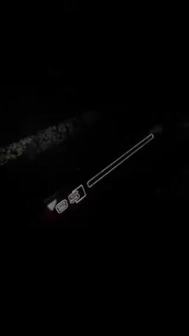 The video begins with a close-up shot of an illuminated Audi S8 logo on the car's door sill. The camera then pans up to show the driver's seat and dashboard of the Audi S8 at night. The instrument cluster is lit with red accents, and the Audi steering wheel is visible. Next, the camera is directed out the window to show the exterior of the car. The camera pans across the landscape showing other cars passing by.