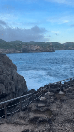 Tourists visit Angel's Billabong natural pool in Nusa Penida