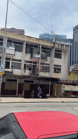 Early morning street life and breakfast documented in Kuala Lumpur