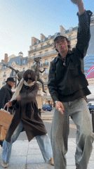Street dancers perform impromptu sidewalk routine in Paris
