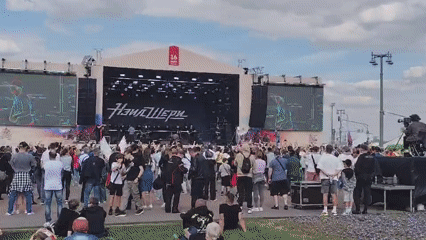 NAZHELCHERI band performs at music festival with crowd attendance
