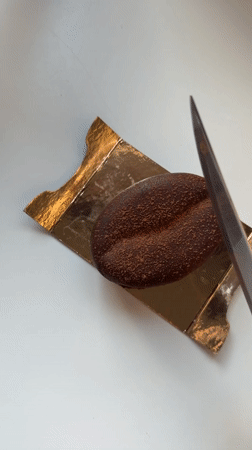 Friends share specialty desserts during evening gathering in Dreiliņi