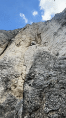 Rock climber scales cliff face in Samovodene, Bulgaria