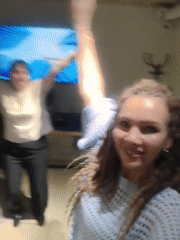 Two women dance, sing, film selfies in casual session