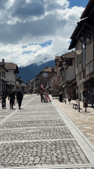 Normal pedestrian activity observed on Bansko cobblestone street