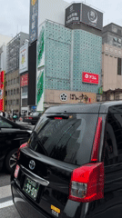Morning street activity documented across Osaka neighborhoods