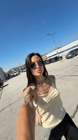Woman Films Selfie Video in Pleven Parking Lot
