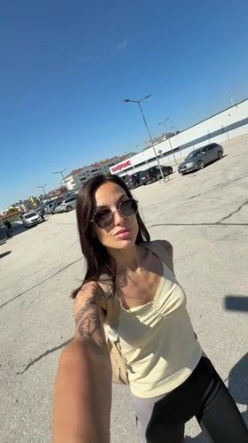 Woman Films Selfie Video in Pleven Parking Lot