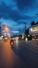 Evening traffic flows through Baan Bo Phut streets