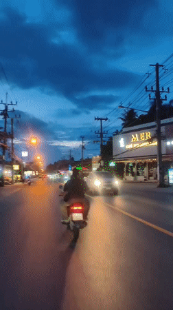 Evening traffic flows through Baan Bo Phut streets