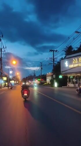 Evening traffic flows through Baan Bo Phut streets