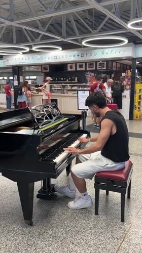 Passing through Lamezia Terme Airport, piano playing inside