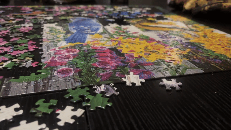 Colorful floral jigsaw puzzle in progress on a Chicago table