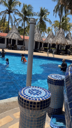 Resort guests play pool volleyball in Porlamar, Venezuela