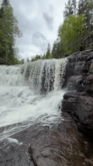 Waterfall and rapids documented in Norwegian forest near Maura