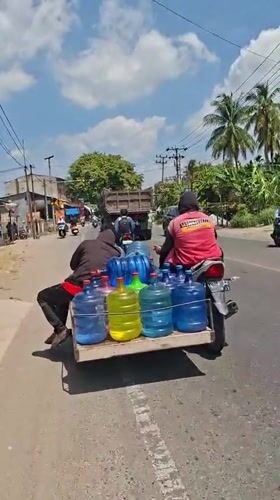 Motorcycle activity observed across two Indonesian villages within minutes