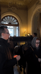 Tourist documents historic churches and artifacts in Riga