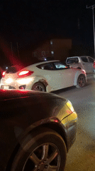 Nighttime traffic scenes documented across Abuja neighborhoods