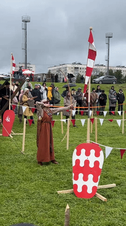 Medieval reenactment event features archery and sword fighting in Russia