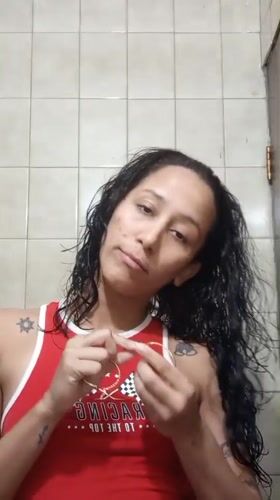 Woman's evening skincare routine recorded in Porlamar bathroom
