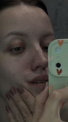 Woman documents skincare routine in Reshetnikovo, Russia evening session
