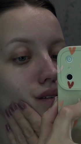 Woman documents skincare routine in Reshetnikovo, Russia evening session