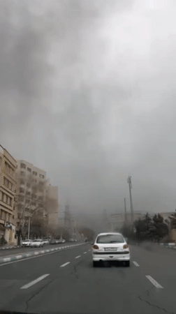 Overcast conditions observed on Tehran street from moving vehicle