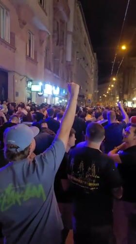 Night crowd celebrates in Budapest streets outside pubs