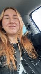 Woman with red hair observed driving in Minsk