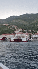 Car ferry crossing the Bay of Kotor near Đurići, Montenegro
