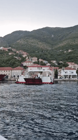 Car ferry crossing the Bay of Kotor near Đurići, Montenegro