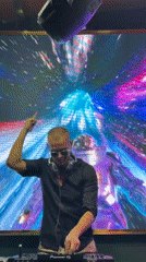 DJ set and disco lights at a Đà Nẵng night event