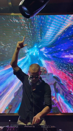 DJ set and disco lights at a Đà Nẵng night event