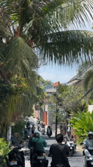 Busy street activity captured in North Kuta, Indonesia