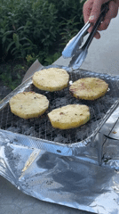 Amsterdam resident grills burgers and pineapple in communal garden
