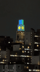 Manhattan skyline at night, shot from bridge and overlook