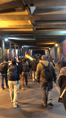 Group with COC banner marches through La Paz tunnel