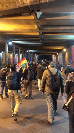 Group with COC banner marches through La Paz tunnel
