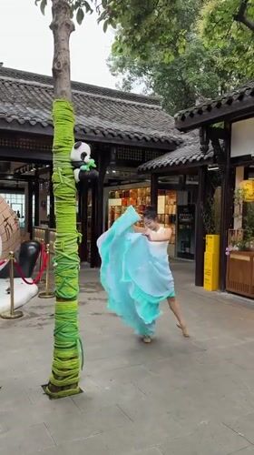 Daily life unfolds around traditional architecture in Qingyang District