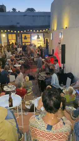 Live band draws crowds to outdoor evening performance in Tavira