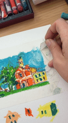 Artist works on colorful pastel drawings in Bat Yam studio
