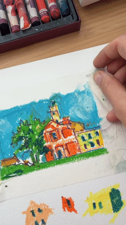 Artist works on colorful pastel drawings in Bat Yam studio